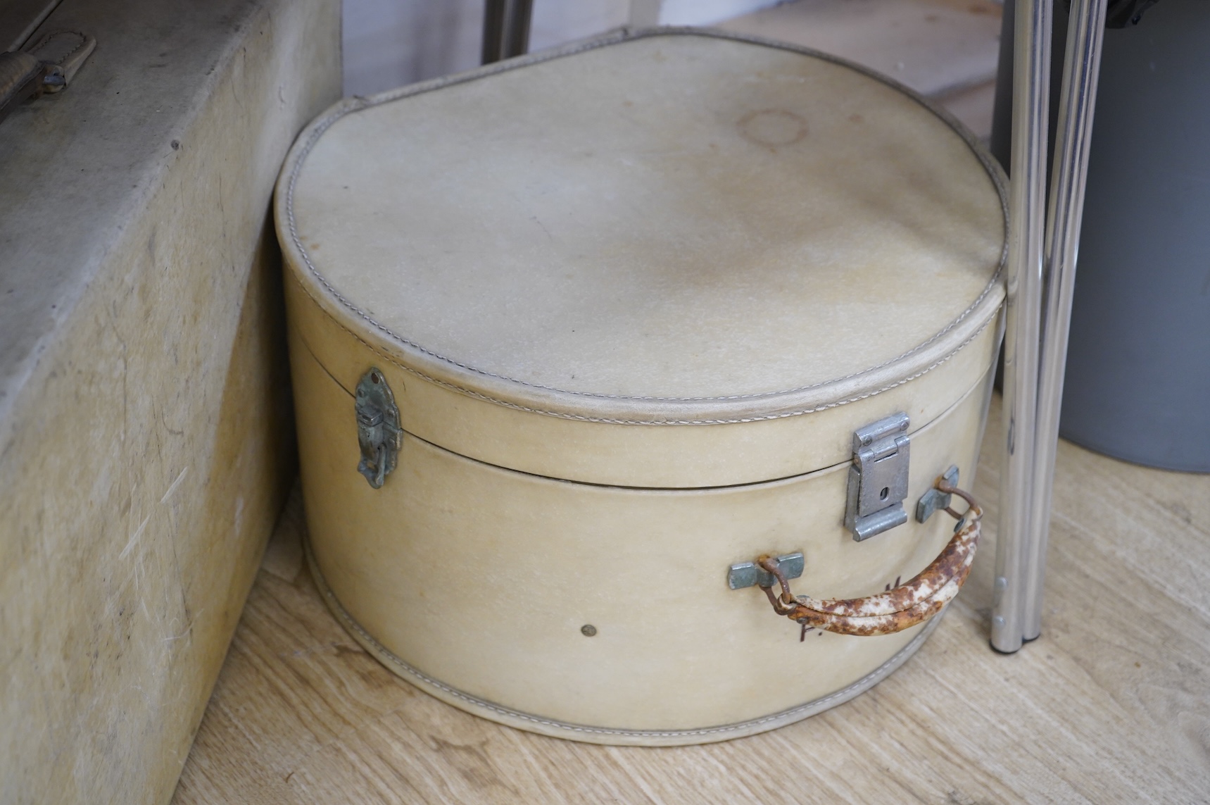 A collection of luggage comprising four vintage trunks and a hat box